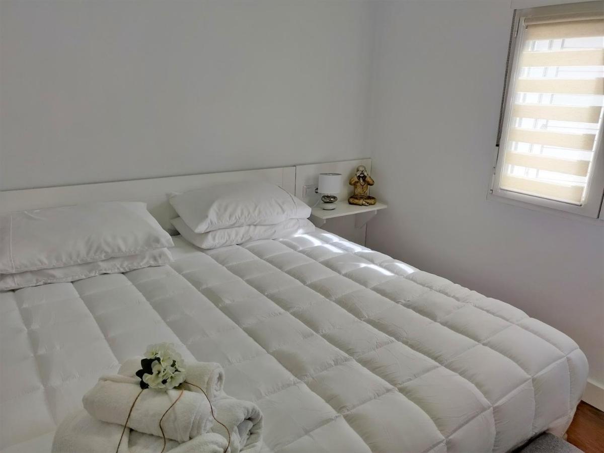 Apartamentos R66 กาเซเรส ภายนอก รูปภาพ